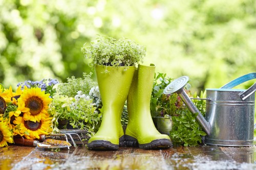 Charitable reuse of surplus planters and materials from a landscaping project